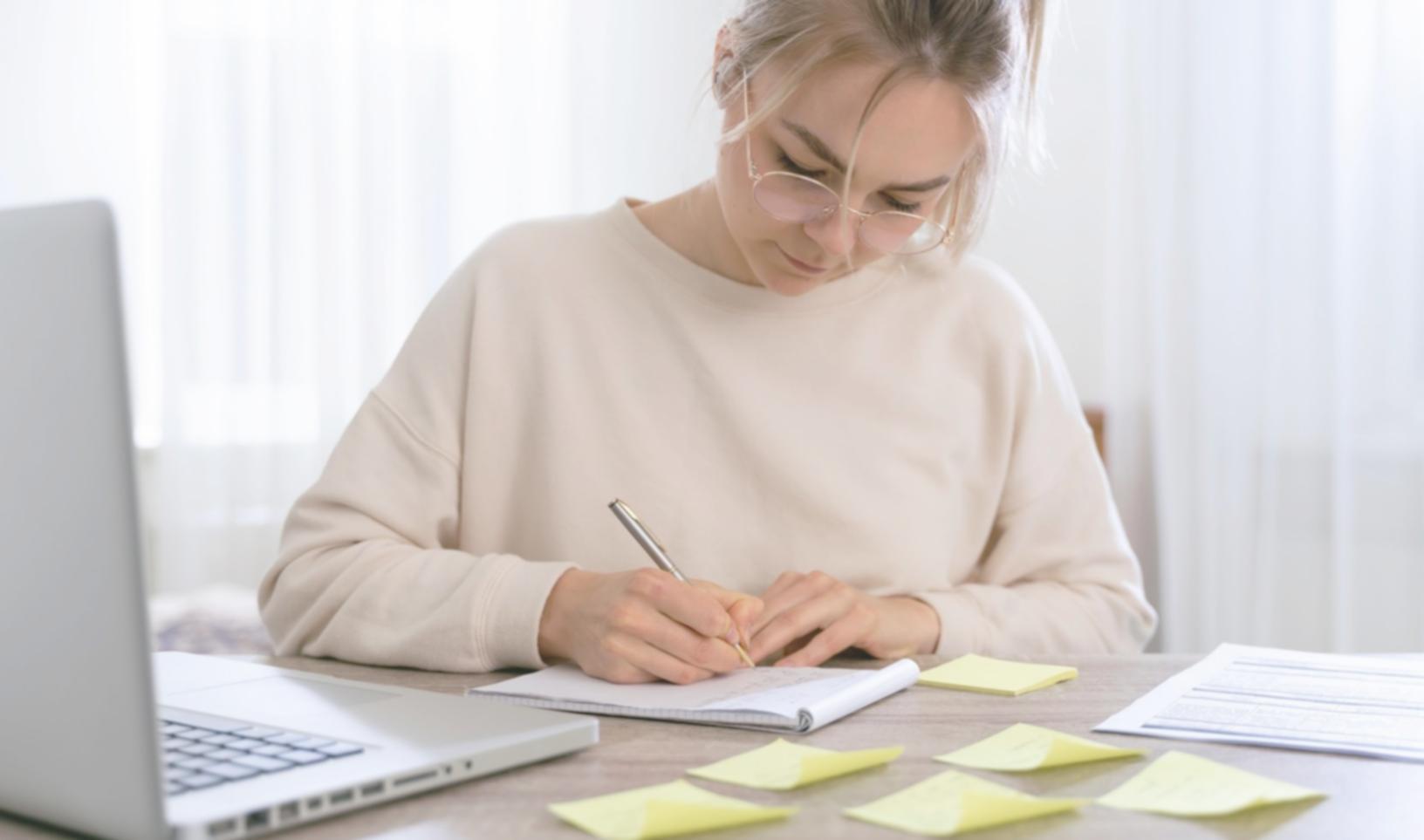 Family reviewing household finances together at kitchen table