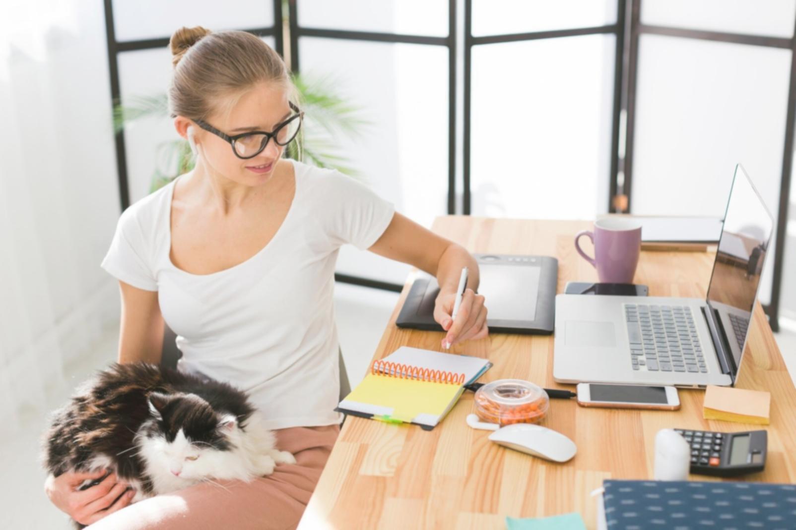 Family reviewing budget documents together at kitchen table